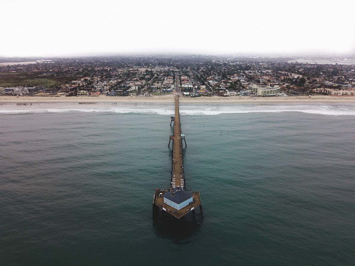 imperial beach brown wooden port on body of water pier